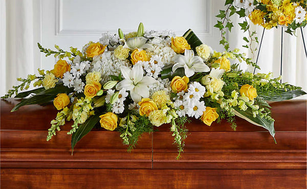 Golden Harmony Casket Spray – Director Flowers